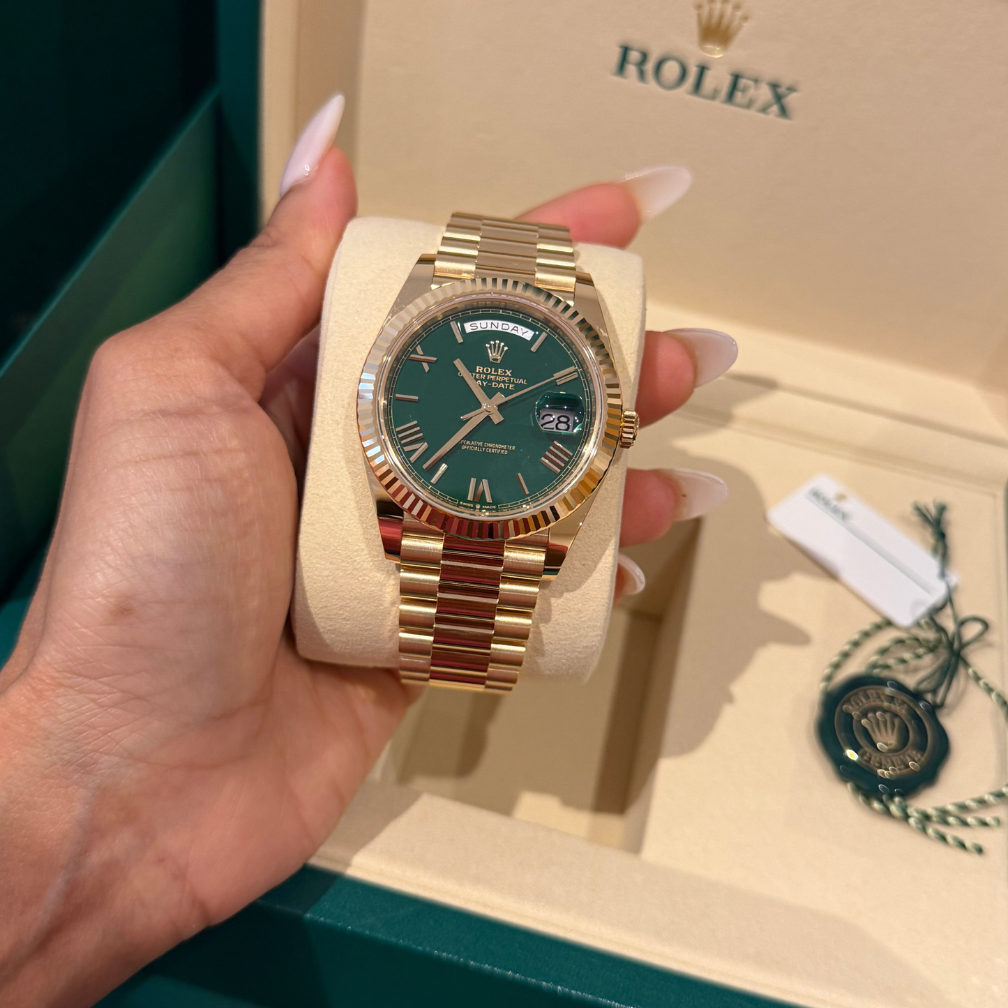 Rolex Day-Date in Gold with Green Dial